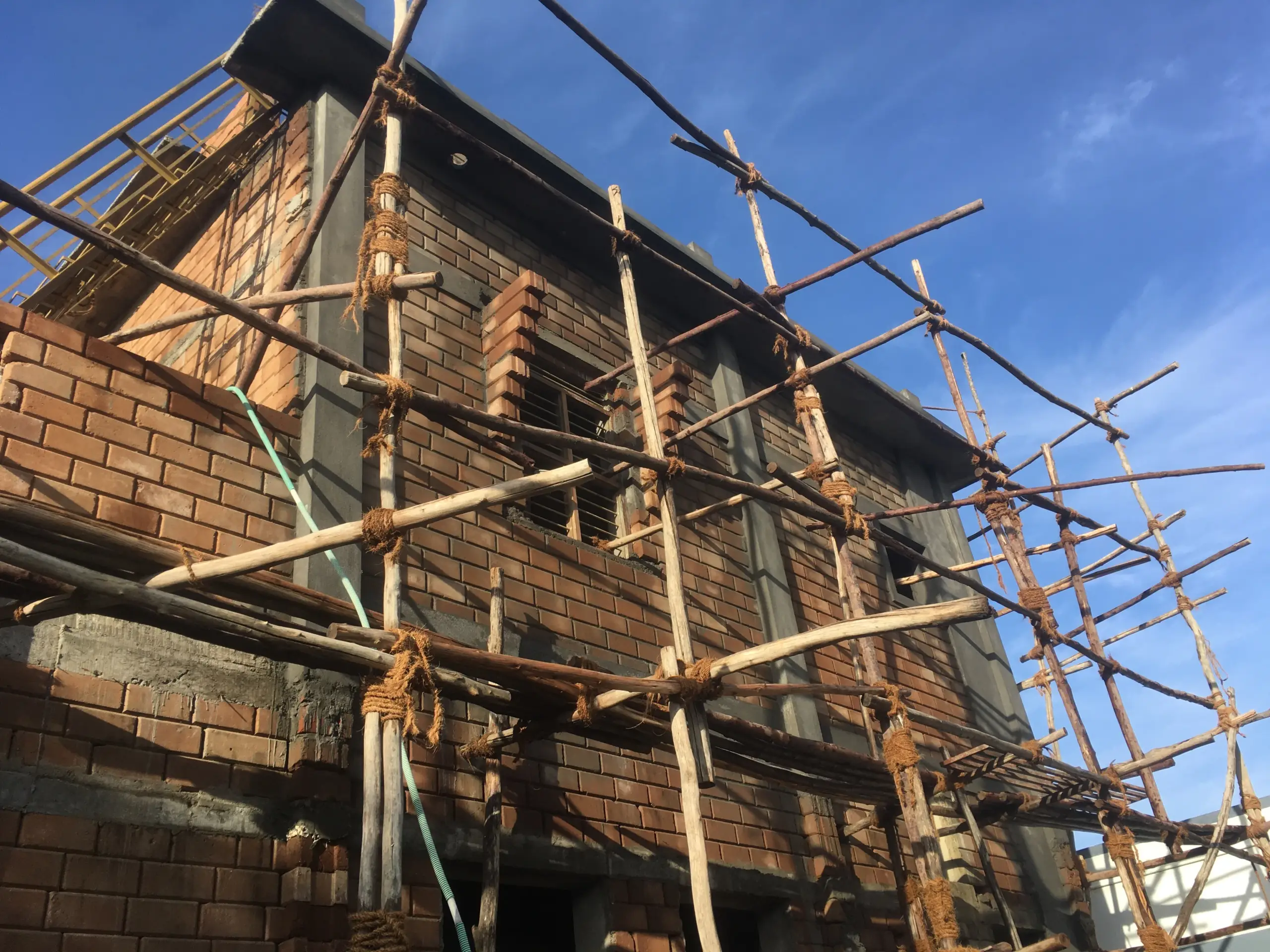 Construction site progress showing structural engineering and project development work